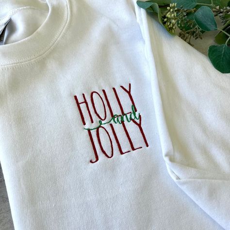 Spread holiday cheer with our collection of embroidered Christmas sweatshirts and gifts featuring Santa, holly, and other festive motifs. Perfect for adding a personal touch to your celebrations! Red Christmas Tshirt Ideas, Christmas Embroidery Crewneck, Red Christmas Sweatshirt, Christmas Sweatshirt Embroidery, Christmas Embroidery Sweatshirts, Embroidered Christmas Sweatshirt, Christmas Hoodies Design, Embroidery Tshirt Ideas, Christmas Embroidery Ideas