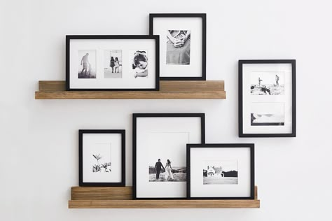 Picture Frames On Small Wall, Picture Frames Decoration Ideas, Asymmetrical Tv Wall Decor, Floating Shelf With Picture Frames, Small Living Room Photo Wall Ideas, Photo Frame Shelf, Staggering Floating Shelves, Floating Shelf Photo Display, Rustic Picture Frames On The Wall