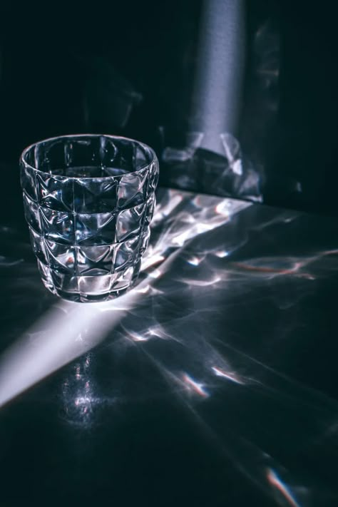 Glass with refraction pattern in darkness · Free Stock Photo Glass Cup Photography, Light Reflection Photography, Light And Dark Photography, Refraction Photography, Drawing Shadows, King Paimon, Photography Shadows, Light And Shadow Photography, Light Refraction