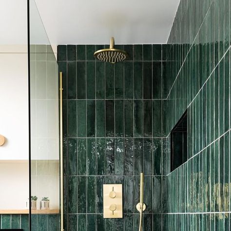 Interior Design- By Jen + Mar | INTERIOR FOX on Instagram: "Whenever we post this emerald green shower on our Pinterest account - it always goes viral (P.S. if you’re on Pinterest, come say hi!) The gold + dark emerald green tiles just look so good together, don’t you think? 💚 #bathroomdesign #bathroominteriors #bathroominteriordesign #bathroominspiration #interiordesigninspiration #interiordesigneruk" Emerald Green Bathroom, Green Shower Tile, Dark Green Tile, Adu Ideas, Dark Green Bathrooms, Green Subway Tile, Green Tile Bathroom, Green Bathroom Decor, Vanities Bathroom