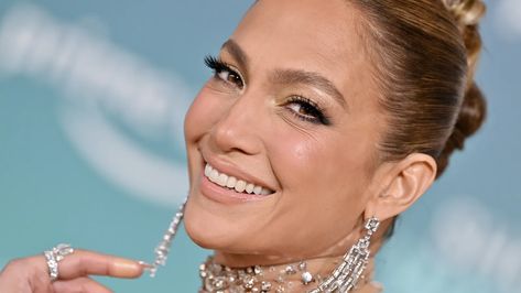 Jennifer Lopez Did TikTok's "Lip Gloss Manicure" Trend and Nailed It — See the Photos | Allure Jennifer Looez, Lip Gloss Nails, Gloss Nails, Jlo Glow, Brow Routine, Quoi Porter, Yellow Swimsuits, French Beauty, Perfect Eyebrows