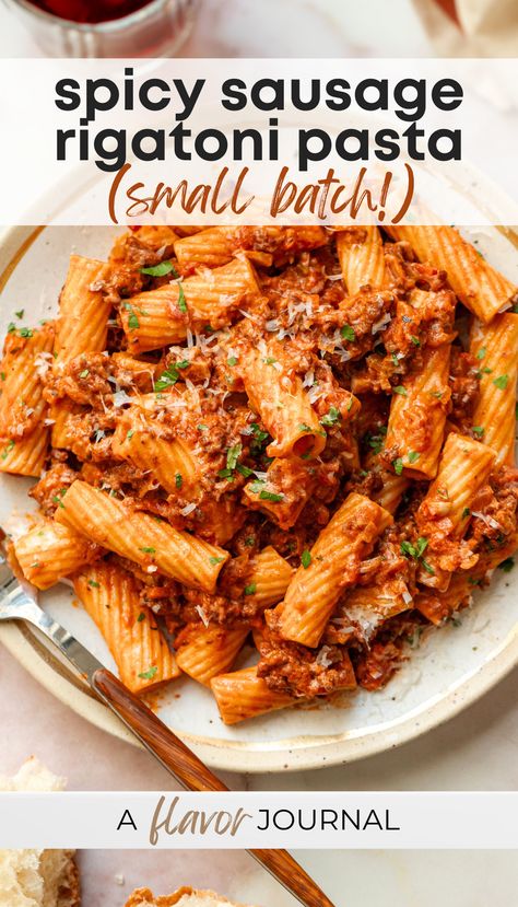 A super cozy pasta recipe with a creamy, tomato-based spicy sausage sauced tossed with rigatoni pasta. This is a smaller batch recipe that makes four servings, but you can double it if needed! #spicysausagerigatoni #rigatonirecipes #pastarecipes #sausagepasta #spicysausagerigatoni Graziano Sausage Recipes, Spicy Sausage Rigatoni, Carbone Spicy Rigatoni Recipe, Spicy Italian Sausage Recipes, Sausage Rigatoni Pasta, Creamy Sausage Rigatoni, Spicy Italian Sausage Recipe, Sausage Rigatoni Recipes, Spicy Sausage Recipes