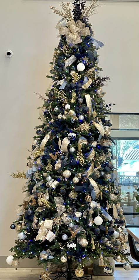 Navy Blue Silver And Gold Christmas Tree, Navy Christmas Trees, Blue And Gold Tree Decorations, Christmas Tree Navy Blue And Gold, Christmas Tree Ideas Gold And Blue, Champagne And Navy Christmas Tree, White Blue Gold Christmas Tree, Blue Gold White Christmas Tree, Midnight Blue Christmas Decorations