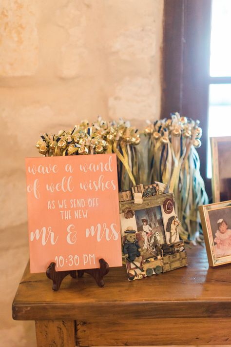 | ribbon wand wedding send off sign | "wave a wand of well wishes as we send off the new mr. & mrs." | unique wedding exit ideas | wedding send off ideas | wedding reception exit ideas | gold wedding ideas | gold + blush pink wedding inspiration | photo taken at THE SPRINGS Event Venue. follow this pin to our website for more information, or to book your free tour! SPRINGS location: Stonebridge in Magnolia, TX photographer: Fulleylove Photography #weddingideas #weddingreception #weddingexit Reception Exit Ideas, Unique Wedding Exit, Wedding Send Off Sign, Wedding Reception Exit, Wedding Ideas Gold, Wedding Send Off Ideas, Reception Exit, Wedding Exit Ideas, Send Off Ideas