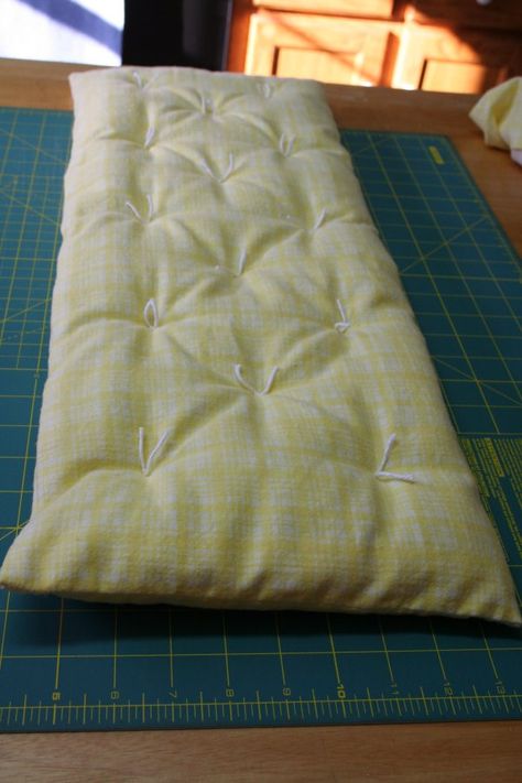 I thought I’d share how I went about making the bedding set for the doll cradle that I posted about last time . First, to make the mattress, I measured the inside bottom of the cradle.   It was 8 ½... Diy Baby Doll Bed, Diy Doll Mattress, Baby Doll Cradle, Baby Doll Furniture, Baby Doll Bed, Cradle Bedding, Doll Cradle, Doll Crib, Doll Things