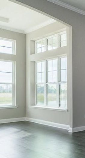 3 Living Room Windows, Transome Window Ideas Exterior, Large Front Window Ideas, Modern Transom Windows Interior, Farmhouse Transom Windows, Window With Transom Above, Transome Window Ideas, Indoor Transom Window, Exterior Transom Windows