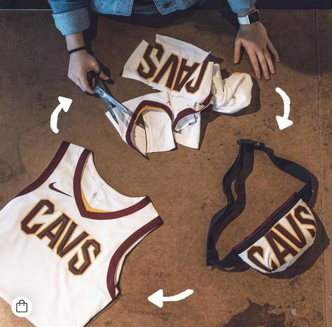 Have you ever wondered what becomes of official NBA jerseys when a player gets traded or decides to “take their talents” elsewhere? Upcycling-savvy business venture, Looptworks, found a more sustainable option that turns your favorite team apparel into one-of-a-kind items that still rep for your favorite franchise.  #gamedayoutfit #nba #cavs #sustainablefashion #sustainable #fashion #portland #pdx #travelportland #ecofriendly #upcycle #sports #diy #jersey Upcycled Sportswear, Jersey Fashion, Nba Outfit, Nba Jersey, Team Jersey, Team Apparel, Fan Gear, Sports Tees, Gameday Outfit