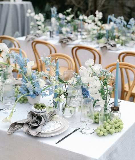 Blue Table Flower Arrangements, Blue Floral Table Setting, October Wedding Blue, Light Blue Wedding Table Decor, Blue Wedding Flowers Centerpieces, Bud Vases Wedding Centerpiece Long Table, Blue Green White Wedding, Blue Wedding Aesthetic, Josie Wedding