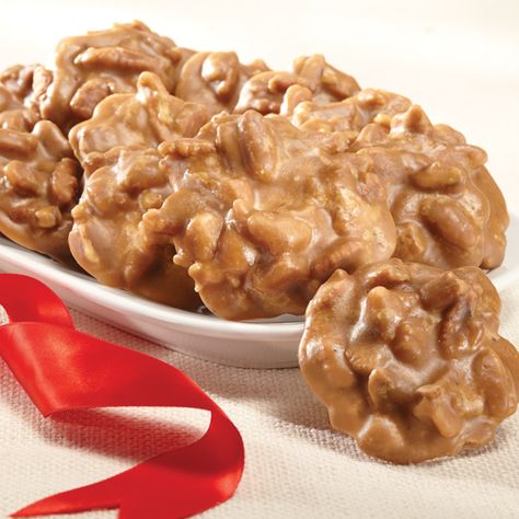 Priester's Louisiana Pralines are an irresistible Southern delicacy. If you haven't tried them, now's as good a time as any. They're cooked in small batches with the freshest ingredients and loads of pecans, then dipped by hand for a melt-in-your-mouth goodness that can't be beat. Pralines Recipe, Mugcake Recipe, Wild Rose Detox Recipes, Trisha Yearwood Recipes, Praline Recipe, Georgia Vacation, Trisha Yearwood, Pecan Pralines, Snacks For Work