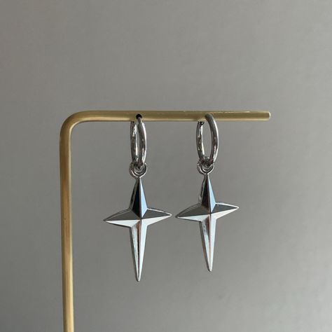 - These Star Earrings are perfect for anyone looking to add a hint of grunge to their look, incredibly unique cool girl vibe star hoops.  -These earrings are made entirely of stainless steel, making them hypoallergenic, TARNISH-FREE, as well as lead and nickel-free. 💕 - Lightweight, super comfortable to wear.  - Versatile, you can take out the star charms if you are in the mood for simple plain huggie, add stars to be more fun! -Shipping: All orders will be shipped out within 1-2 business days after the order has been received. Ship from New York, United States. USPS first class mail on this order. 🚗 - For matching necklace:  https://www.etsy.com/listing/1773704379/chunky-star-stainless-steel-layered - Thank you for visiting my listing. - Follow us on Instagram: funbeadsbygrace for more Hoop Earrings Y2k, Holiday Party Earrings, Grunge Star, Earrings Y2k, Star Celestial, Girl Vibe, Celestial Earrings, Dangle Hoop Earrings, Party Earrings