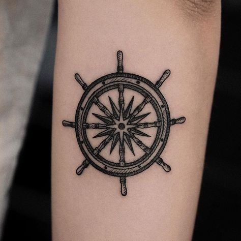 Sea Ship Tattoo, Anchor And Ship Wheel Tattoo, Traditional Ship Wheel Tattoo, Ship Tattoo Women, Ship Steering Wheel Tattoo, Seaman Tattoo Design, Steering Wheel Tattoo, Pirate Ship Steering Wheel, Coastal Tattoos