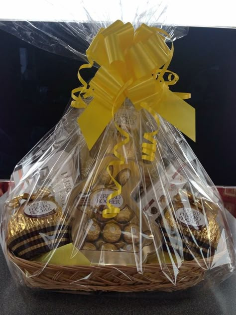 Ferrero rocher Easter hamper Hamper Baskets Ideas, Easter Hampers Ideas, Chocolate Hampers Diy, Ferraro Rocher Wreaths, Hamper Basket Decoration, Chocolate Hamper Ideas Baskets, Chocolate Hamper Ideas Gifts, Chocolate Hamper Ideas, Chocolate Hamper Basket