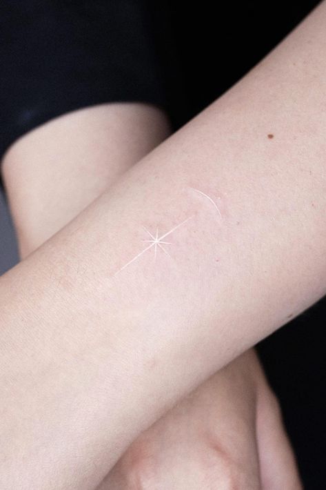 35 Hot Small Star Tattoo Design Ideas North Star Tattoo White Ink, White Sparkle Tattoo, Northern Star Drawing, White Ink Star Tattoo, White Ear Tattoo, Polar Star Tattoo, 8 Pointed Star Tattoo, North Star Tattoo Design, White Tattoos For Women