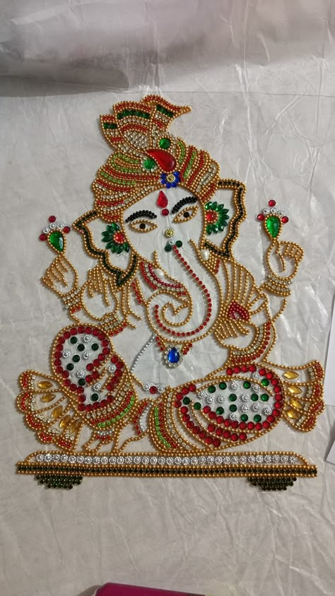 Kundan rangoli.. made by me...new 2022 Dasara Photo, Machi Work, Bird Silhouette Art, Ganesha Rangoli, God Pic, Kundan Rangoli, Venkateswara Swamy, Peacock Embroidery Designs, Aari Design