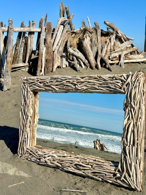 Coastal style driftwood mirror made with handpicked driftwood from the California coast. Measuring 2ft by 3ft, this mirror is a perfect fit for any room.  Hanging hardware is on the back and can be hung horizontally or vertically.  These driftwood mirrors are made with all  up -cycled materials and alot of love.  Add my shop to your favorites. There you will see the latest shop additions and sales.  Please email me with questions I am always happy to chat.  Thanks for stopping by! ❤️ Beach Vanity, Driftwood Mirrors, Rustic Arbor, Coastal Mirrors, Driftwood Frame, Driftwood Mirror, Pine Cone Art, Driftwood Wall, Driftwood Wall Art