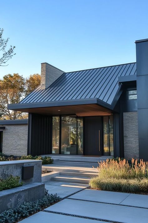 Modern house facade with assymetrical zinc roof. Check out all of these sleek and stylish modern houses with zinc roofs Metal Modern House, Modern Roof Design, Soffit And Fascia, Metal Roofing Ideas, Metal Roof Panels, Metal Roof Houses, Perforated Metal Panel, Sustainable House Design, Zinc Roof