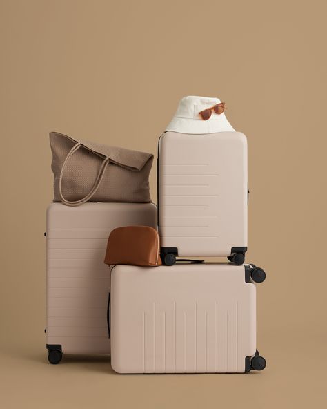 Ready to have your smoothest home-for-the-holidays experience ever? No guarantees on getting along with your sister, but we can promise that the Japanese-crafted, 360-degree wheels on our ultra-light suitcases will help while you’re en route. Mix and match our beige and tan bags to keep your color palette tight. Luggage Product Photography, Hrvatski Pleter, Travel Props, Suitcase Photography, Luggage Photography, Organized Minimalist, Suitcase Ideas, Neoprene Backpack, Preppy Travel