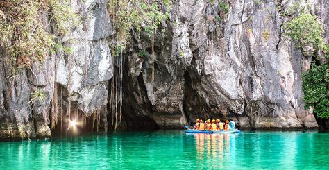 Puerto Princesa Subterranean River National Park is about 47 miles from Palawan’s capital, but the excursion is definitely worth the trip. Declared an official UNESCO World Heritage Site, the national park features impressive cave systems towering over the navigable underground river. Considered one of the longest underground rivers in the world at a little over five miles long, the subterranean park can be explored by paddleboat, with caves on either side featuring limestone karst landscapes, i Puerto Princesa Subterranean River, Philippines Vacation, Underground River, Tropical Islands Paradise, Puerto Princesa, Hidden Beach, Boracay, Natural Park, Island Hopping