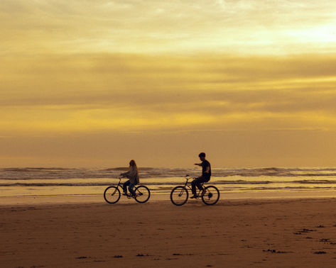 Cinematic, canon beach, Oregon, 80s rom com, vintage aesthetic, passion, twilight, Oregon coast, bikes, bike shoot, motion blur, casual outfits, screen grabs, dress, movie scenes, film, vintage, cozy, movie scenes, couples inspo, aesthetic, couples photos, in love, young, free, movie stills, cinematography, documentary style photography, storytelling, colorado photographer, couples photos, Oregon photographer, cinematic imagery, Film Scenes Cinematography, Beach Movie Aesthetic, Young And Free Aesthetic, Twilight Oregon, Cinematography Documentary, Canon Beach Oregon, Canon Beach, Beaches Film, Photography Storytelling