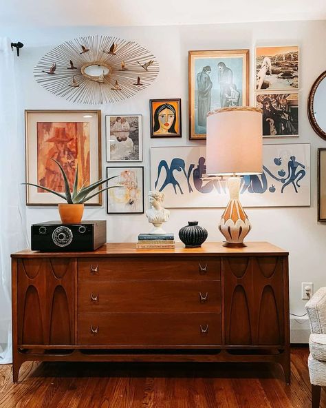 A wooden sideboard is the ultimate accessory for any common area in your home, thanks to the versatility of these pieces. Use these features to host an arrangement of eclectic items, including table lamps and books. Focus on artistic energy for a gallery wall with images that demand attention. Art Above Sideboard, Washi Tape Headboard, Diy Wall Artwork, Winter Table Centerpieces, Modern White Bedroom, Living Room Orange, Creative Wall Art, Wall Art Ideas, Wooden Sideboard