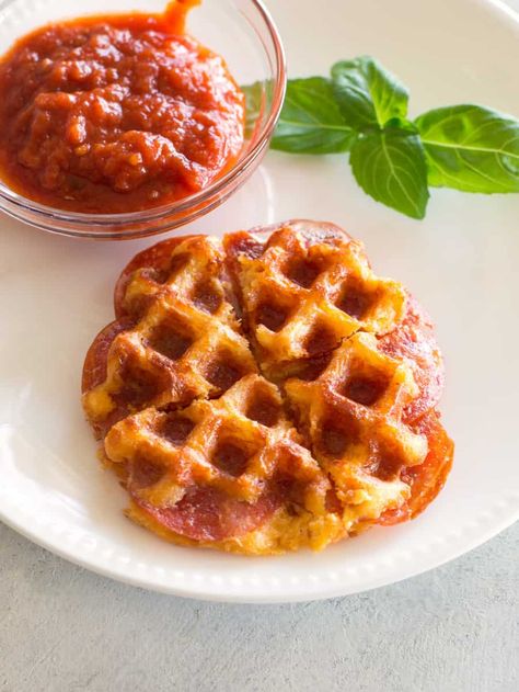 A Pizza Chaffle is a crispy low-carb recipe made with eggs, cheese, and pepperoni. Dip in warm marinara for the full experience. #keto #pizza #chaffle #recipe Pizza Chaffle Recipe, Recipe Chart, Pizza Chaffle, Pepperoni Dip, Witch Recipes, Crafty Witch, The Girl Who Ate Everything, Chaffle Recipe, Waffle Maker Recipes