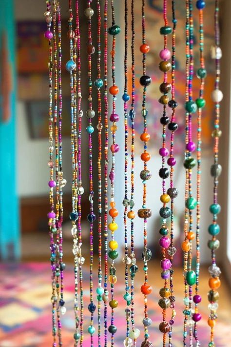 "Transform any doorway with a stunning DIY Beaded Curtain! 🎋💎 A fun and easy way to bring a touch of bohemian flair to your home. 🌟✨ #BohemianDecor #BeadedArt #DIYHomeDecor" Diy Beaded Curtain, Beaded Curtains Diy, Beaded Curtains Doorway, Bead Curtain, Diy Kandi, Beaded Curtain, Witch Crafts, Hippie Homes, Decor Objects