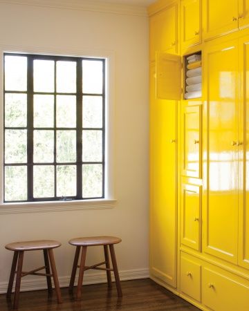 Bright yellow storage - for around the corner in my dining room? Yellow Laundry Rooms, Yellow Paint Colors, Yellow Cabinets, Furniture Casters, Wichita Ks, Yellow Kitchen, Trendy Kitchen, Yellow Painting, California Homes