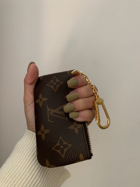 Lv key pouch and some pretty greens Lv Coin Pouch, Louis Vuitton Key Pouch Aesthetic, Lv Coin Purse, Dreams Vision Board, Lv Pouch, Aesthetic Luxury Lifestyle, Vestidos Sport, Lv Key Pouch, Amazon Wedding Registry