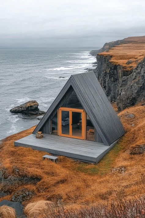 Rustic A-frame cabin perched on a cliffside. Uncover how sleek design, cozy woodwork, and a dash of minimalist charm are transforming cabins from rustic hideaways to luxurious retreats. Modern Cabins, Chic Cabin, Nice Houses, Beach Shacks, Cabin Modern, Glamping Resorts, Forest Backdrops, Frame Cabin, Wooden Porch