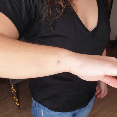 Letter Initial Tattoo Placement, Tiny Side Wrist Tattoos For Women, Single Letter Tattoo Placement, Wrist Letter Tattoo, Tattoo With Letter A, F Tattoo Letter Initial, Fine Line Initial Tattoo, Letter Tattoo Placement, A Initial Tattoo