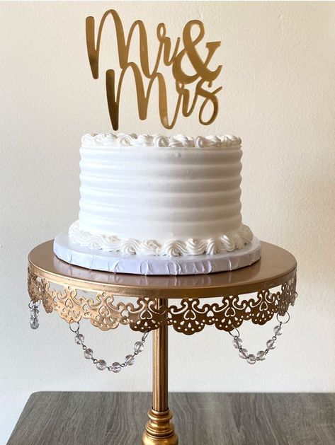 Wedding Cake Topper | Cake Topper | Mr & Mrs What's a wedding with a cake? And no cake is complete with a final, elegant touch of reminding you of finally being Mr. & Mrs. This wedding cake topper is the perfect final touch! #ad #wedding #weddingcake #cake #caketopper #mrandmrs #calligraphy #cursive #elegant #gold Wedding Cake Toppers Rustic, Wood Cake Topper Wedding, Mr Mrs Cake Toppers, Wood Cake Topper, Rustic Wedding Cake Toppers, Rustic Cake Toppers, Cake Topper Wedding, Wood Cake, Topper Wedding