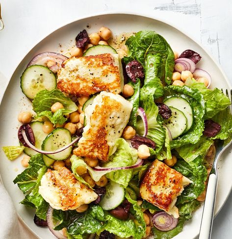 There are a few reasons why this delicious grilled halloumi cheese salad is going to become your summer dinner fave. First, it’s easy to throw together after work, and still manages to be super filling. Second, it hits all the right flavor notes, from briny olives to spicy garlic and cool, crunchy cucumbers. But, the most important reason to make this salad is to eat grilled halloumi, a firm cheese that can stand the heat of a grill or grill pan. The taste is salty like feta, but you can cut ... Halloumi Salad Recipes, Cheese Salad Recipes, Summer Vegetarian Recipes, Halloumi Cheese, Halloumi Salad, Grilled Halloumi, Hearty Salads, Cheese Salad, Summer Dinner