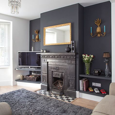 Traditional living room with grey painted feature wall | 20 ways with paint | Decorating ideas | PHOTO GALLERY | Housetohome.co.uk Paint Decorating Ideas, Painted Feature Wall, Dark Grey Living Room, Feature Wall Living Room, Furnitur Ruang Keluarga, Wall Fireplace, Designer House, Dark Living Rooms, Painting Dark