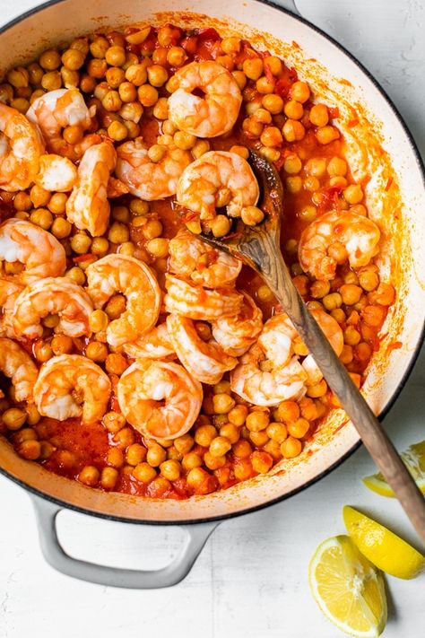 This easy Harissa Shrimp and Chickpea dish is super fast, made all in one skillet, and takes under 10 minutes to make. A great way to use pantry and freezer staples. Harissa Shrimp, Freezer Staples, Divine Atelier, Pescatarian Meals, Seafood Meals, Harissa Chicken, Beans Beans, Hall Cupboard, Gym Diet