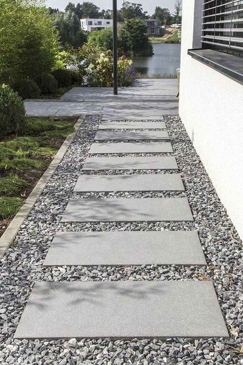 The concrete stepping blocks leading to the house always looks appealing. The straight pathway with pebbles is easy to maintain. Front Garden Entrance, Front Yard Walkway, Walkway Landscaping, Pathway Landscaping, Walkways Paths, Side Yards, Gravel Garden, Garden Walkway, Stone Pathway