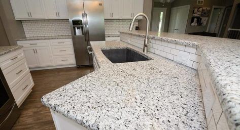 White granite with black and grey spots - Decoist Silver Grey Honed Granite, Galaxy Grey Granite, Popular Granite Colors, Galaxy Gray Honed Granite, Dark Granite Countertops, White Granite Colors, Sensa Blanco Gabrielle Granite, Kitchen 2021, Sensa Black Beauty Granite