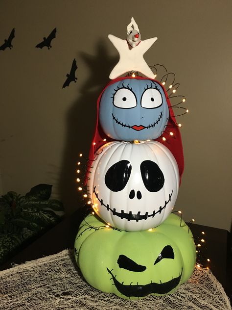 OogieBoogie, Jack Skellington, Sally, and Zero stacked to form a Christmas tree shape. Oogey Boogey Pumpkin, Tim Burton Pumpkin Painting, Cute Painted Pumpkin Ideas, Pumpkin Inspo, Pumpkin Paint, Moldes Halloween, Nightmare Before Christmas Pumpkin, Halloween Pumpkin Crafts, Jack Skellington Pumpkin