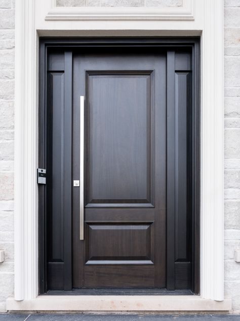 Solid wood front door designed and made by Arista Doors. #aristadoors #solidwooddoor #classicdoor #doormanufacturer #architecture #wooddoors #exteriordoors #carpentry #interiordesign #design #toronto #designinspiration #exteriordesign #customdesign #torontoarchitecture #canadianarchitecture #frontdoor #frontdoordesign Solid Wood Front Door, Toronto Architecture, Classic Doors, Door Manufacturer, Wood Front Doors, Solid Wood Doors, Traditional Exterior, Raised Panel, Front Door Design