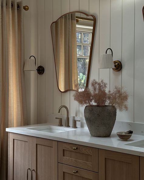 Your morning rituals with an upgrade. ✨ The existing primary ensuite in our client’s home lacked storage, had a cramped shower, and even walls that didn’t reach the ceiling! 😳 This timeless design makes the ensuite feel more spacious and functional with a double vanity, tall vaulted ceilings, shiplap cladding, and an extended shower. . . . . . . . #torontointeriordesigner #architecturaldigest #houseandhome #domino Timeless Primary Bathroom, Shiplap Wainscoting, Primary Ensuite, Ensuite Vanity, Vertical Shiplap, Toronto Interior Design, Shiplap Cladding, Shiplap Bathroom, Vanity Counter