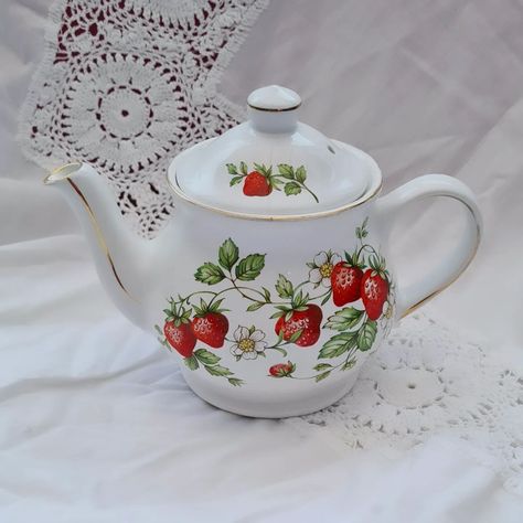 Here's today's #vintagefloralweek offering. Thank you @ aloadofoldtatvintage for hosting. Full bof summer vibes, this pretty little vintage teapot is perfect for just one. Why not take a little time to yourself and enjoy the moment? Made by Sadler, it's in excellent vintage condition with minimal wear. £12 on the website (link in bio) #strawberries #giltdged #teapot #timefortea #teaforone #afternoontea #vintagechina #sadler Strawberry Teapot, Teapot Tattoo, Vintage Teapot, Enjoy The Moment, Tea For One, Tea Pots Vintage, Heart Candy, Website Link, Vintage China