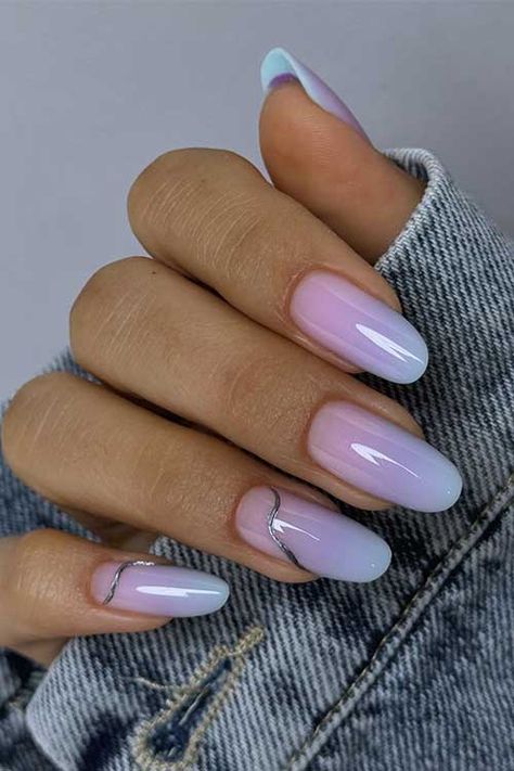 Long almond shaped pastel summer ombre nails feature pink, purple to light blue ombre style Nails Blue And Pink Pastel, Blue Purple Gradient Nails, Pastel Ombre Nails Almond, Pink And Blue Ombré Nails, Purple Blue Ombre Nails, Nail Ideas Pastel Colors, Pink And Blue Almond Nails, Light Purple Ombre Nails, Ombre Almond Shaped Nails