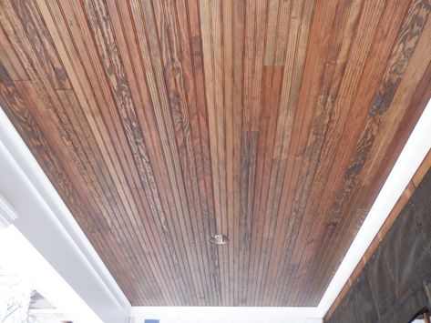 Porch Ceilings Gallery | Siding Express Porch Ceiling Beadboard, Porch Ceiling Ideas Cheap, Pole Barn Interior Ideas, Stained Beadboard Ceiling, Beadboard Porch Ceiling, Stained Beadboard, Black String Lights, Brick Porch, White Beams