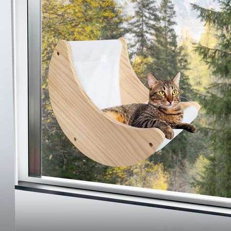 PRICES MAY VARY. Heavenly comfort: Treat your kitty to a cosy and unique resting spot with the cat window hammock. Designed to resemble a crescent moon, it adds a touch of whimsy to any room. Secure and stable: Three heavy duty suction cups ensure a secure fit to your window, giving you the peace of mind that your cat is safe while enjoying the elevated view. The window cat bed can withstand even the most enthusiastic of jumping cats.omfortable for cat. Space-saving design: Make the most of your Window Beds, Window Cat Bed, Cat Window Bed, Cat Window Hammock, Birds Pet, Cat Space, Cat Window Perch, Window Perch, Window Seats