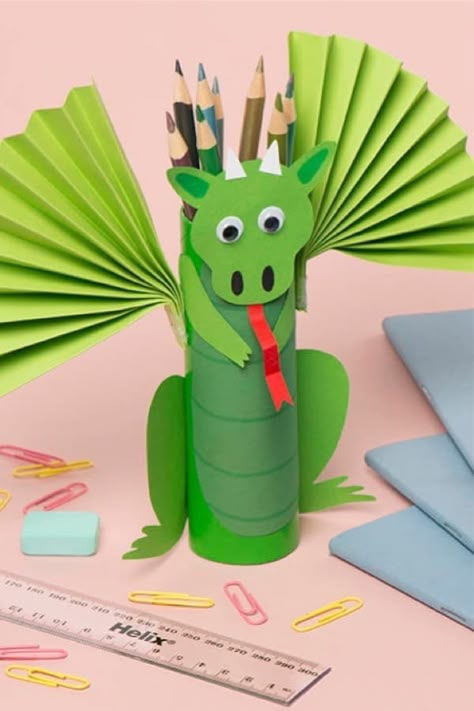 Looking for a fun and easy way to entertain the kids will doing a little recycling at the same time!? Check out these adorable toilet paper roll craft ideas to try! #diy #crafts #kidscrafts #paperrollcraft #toiletrollcraft Magical Beasts, Paper Dragon, Toilet Roll Craft, Desk Diy, Toilet Paper Tube, Toilet Paper Crafts, Dragon Crafts, Folding Origami, Toilet Paper Roll Crafts