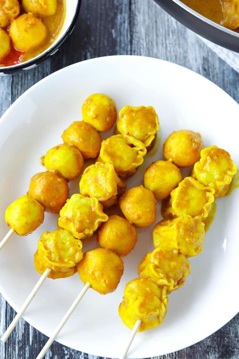 Hong Kong Curry Fish Balls is a classic street food snack that boasts a delicious, spicy and fragrant curry sauce! It's easy to make, and can be enjoyed street food style on wooden skewers, in a bowl drizzled with plenty of chili oil, or over steamed rice or noodles! #thatspicychick #curryfishballs #hongkongcurryfishballs #cantonesefood #appetizer #snack #streetfood #hongkongfood #easyrecipes | That Spicy Chick Curry Fishball, Hong Kong Style Mango Pancake, Hong Kong Curry Fish Ball, Fishball Street Food Philippines, Hong Kong Pancake, Hong Kong Style Steamed Fish, Cantonese Food, Hong Kong Food, Fish Ball