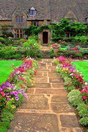 Flowers along front walkway 5 Inexpensive Ways to Boost Curb Appeal Creative Pathways, Dream Estate, English Homes, Dream Escape, Tudor Cottage, Walkway Ideas, Front Walkway, Gardening Inspiration, Garden Beautiful