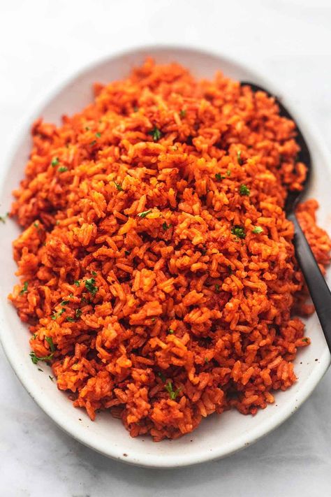 Easy Mexican Rice is that perfect side dish you'll want to make again and again. Buttery rice meets south-of-the-border spices meets tomatoey goodness all in one dish for easy clean up! Rice For Burritos, Spicy Mexican Rice, Mexican Rice Dishes, Rice Spanish, Easy Mexican Rice, Rice Spices, Vegetarian Rice Recipes, Buttery Rice, Spanish Rice Easy