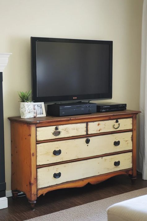 "Elevate your media setup with a Repurposed Dresser TV Stand! 🛠️📺 Perfect for a creative and budget-friendly solution. 🌟✨ #DIYFurniture #TVStandMakeover #RepurposedDecor" Dresser Into Tv Stand, Cottage Tv Stand, Tv Stand Makeover, Vintage Tv Stand, Dresser Tv, Repurposed Dresser, Dresser Tv Stand, Repurposed Decor, Dresser With Tv