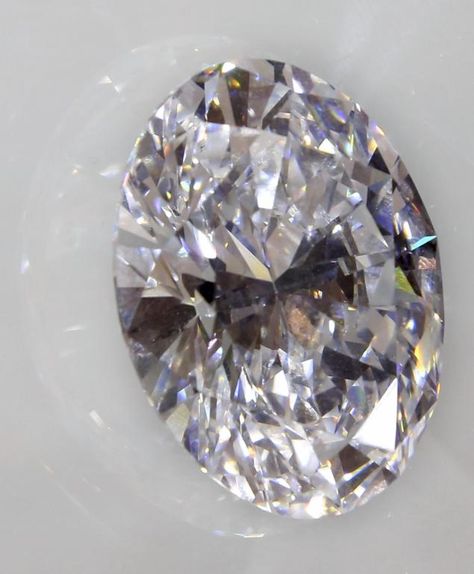 The 118-carat white diamond has a pre-sale estimate of $28 million to $35 million. Precious Jewels, Glass Case, Fabulous Jewelry, Oval Stone, Precious Gems, Gems And Minerals, Gems Jewelry, Stone Rocks, Oval Diamond