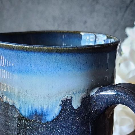 Kelsey Schroeder on Instagram: "Another recent glaze test that I'm loving! I'm thinking this could be good for some night skies on bat mugs, or maybe for some deep ocean mugs too... what animals do you see with this glaze?  Glazes are @amacobrent black aventurine and midnight run . . . . . #howiamaco #blackglitter" Blue Rutile Glaze Combos, Norse Blue Glaze, Galaxy Pottery Glaze, Blue Rutile Glaze, Mottled Blue Glaze, Some Nights, Pottery Glazes, Black Glitter, Night Skies